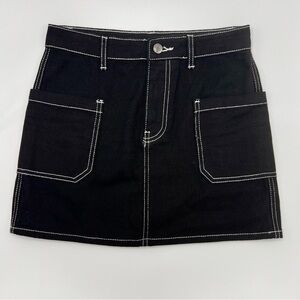 Black mini skirt, size S.  White stitching